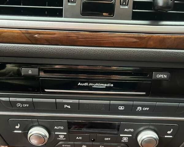 Черный Ауди А6, объемом двигателя 2 л и пробегом 317 тыс. км за 18900 $, фото 24 на Automoto.ua