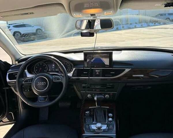 Черный Ауди А6, объемом двигателя 1.98 л и пробегом 155 тыс. км за 12500 $, фото 4 на Automoto.ua