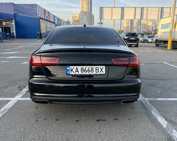 Черный Ауди А6, объемом двигателя 1.8 л и пробегом 230 тыс. км за 17000 $, фото 1 на Automoto.ua