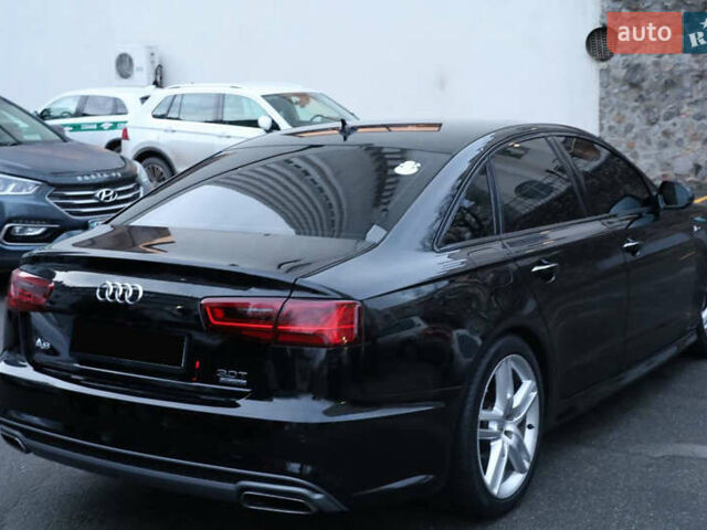 Черный Ауди А6, объемом двигателя 3 л и пробегом 155 тыс. км за 18999 $, фото 5 на Automoto.ua