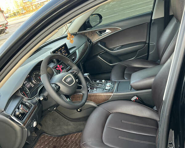 Черный Ауди А6, объемом двигателя 1.8 л и пробегом 230 тыс. км за 17000 $, фото 14 на Automoto.ua