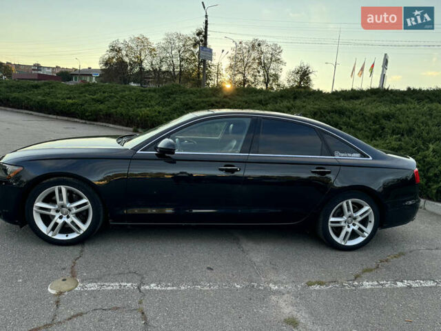 Черный Ауди А6, объемом двигателя 2 л и пробегом 180 тыс. км за 15000 $, фото 1 на Automoto.ua