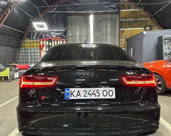 Черный Ауди А6, объемом двигателя 1.98 л и пробегом 191 тыс. км за 24000 $, фото 7 на Automoto.ua