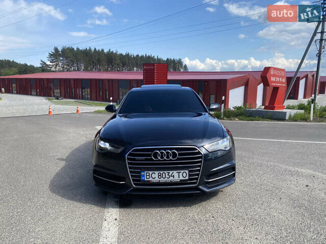 Черный Ауди А6, объемом двигателя 1.98 л и пробегом 206 тыс. км за 16900 $, фото 1 на Automoto.ua