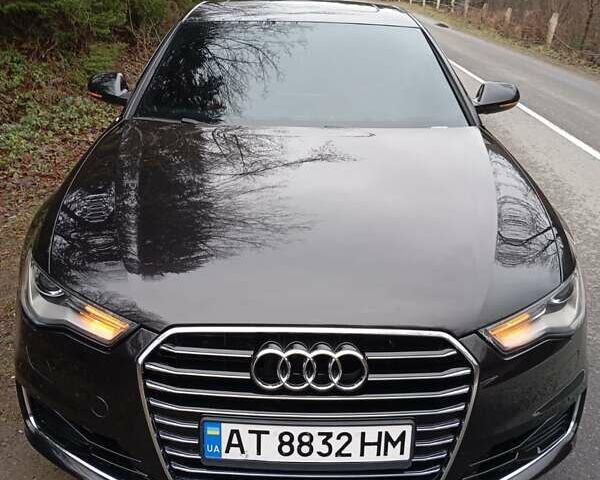 Черный Ауди А6, объемом двигателя 2 л и пробегом 317 тыс. км за 18900 $, фото 1 на Automoto.ua