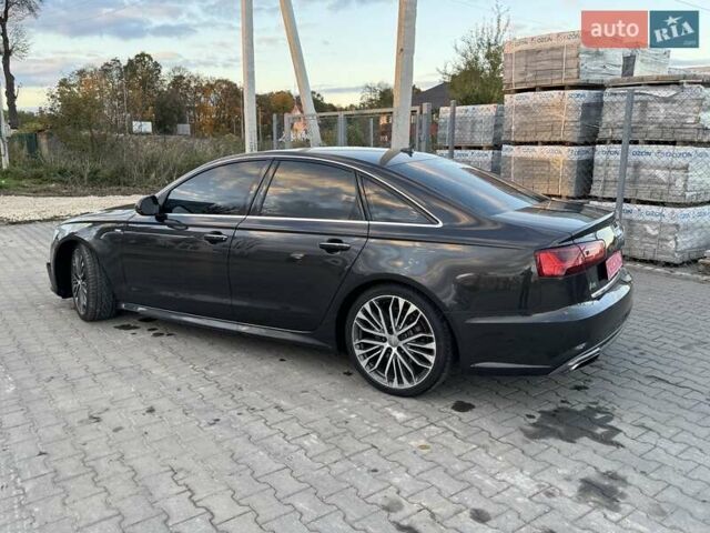 Черный Ауди А6, объемом двигателя 1.98 л и пробегом 161 тыс. км за 15900 $, фото 1 на Automoto.ua