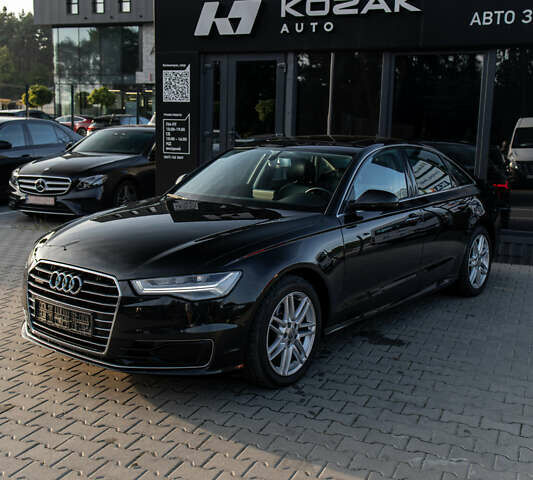 Чорний Ауді А6, об'ємом двигуна 2 л та пробігом 118 тис. км за 25900 $, фото 1 на Automoto.ua