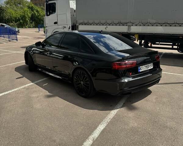 Черный Ауди А6, объемом двигателя 1.98 л и пробегом 204 тыс. км за 19000 $, фото 6 на Automoto.ua