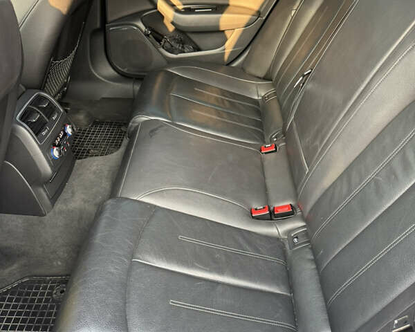Черный Ауди А6, объемом двигателя 1.98 л и пробегом 147 тыс. км за 14900 $, фото 19 на Automoto.ua