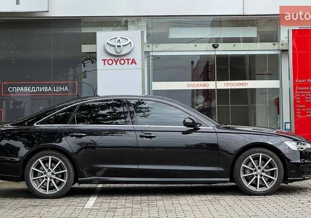 Черный Ауди А6, объемом двигателя 2.97 л и пробегом 229 тыс. км за 20562 $, фото 7 на Automoto.ua