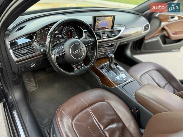 Черный Ауди А6, объемом двигателя 1.98 л и пробегом 167 тыс. км за 16000 $, фото 17 на Automoto.ua