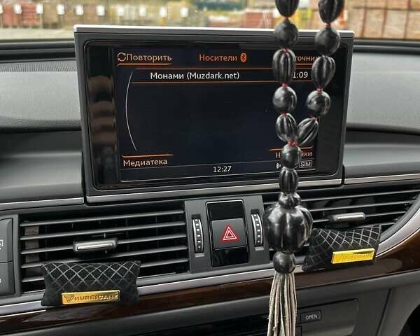 Черный Ауди А6, объемом двигателя 1.98 л и пробегом 245 тыс. км за 21000 $, фото 29 на Automoto.ua