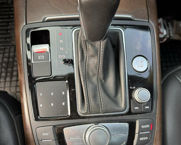 Черный Ауди А6, объемом двигателя 1.98 л и пробегом 147 тыс. км за 14900 $, фото 12 на Automoto.ua