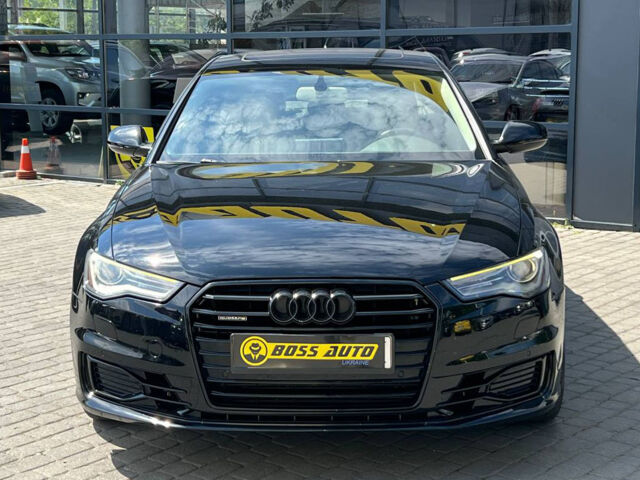 Черный Ауди А6, объемом двигателя 2 л и пробегом 255 тыс. км за 16800 $, фото 1 на Automoto.ua