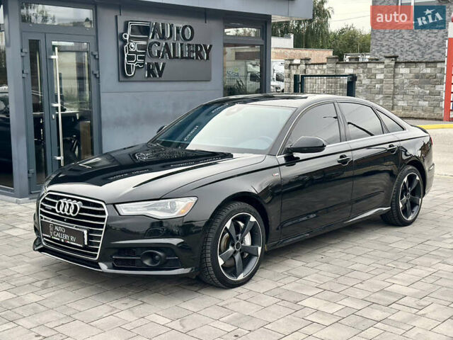 Черный Ауди А6, объемом двигателя 2 л и пробегом 132 тыс. км за 17988 $, фото 1 на Automoto.ua