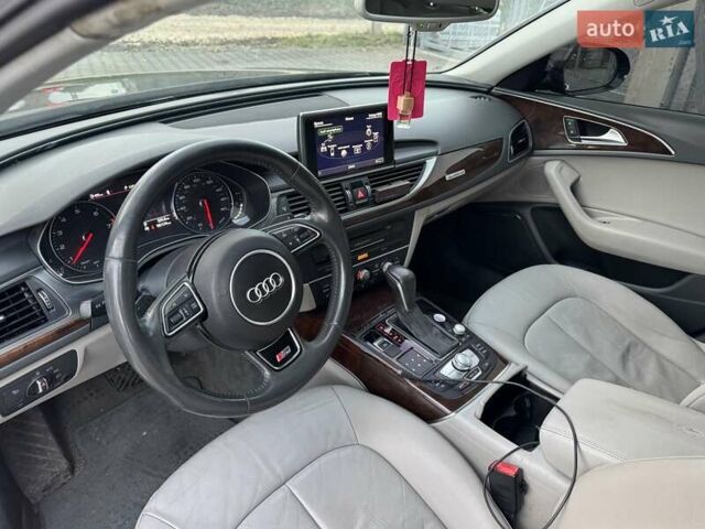 Черный Ауди А6, объемом двигателя 1.98 л и пробегом 161 тыс. км за 15900 $, фото 12 на Automoto.ua
