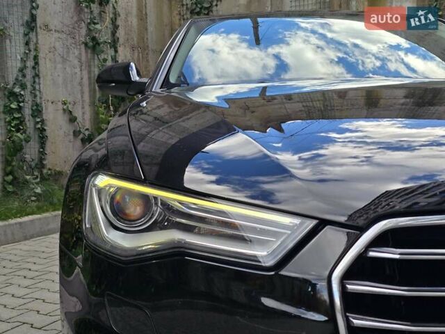 Ауді А6 2015 у Хмельницькому на Automoto.ua Чорний Ауді А6, об'ємом двигуна 1.97 л та пробігом 238 тис. км за 19999 $, фото 63 на Automoto.ua