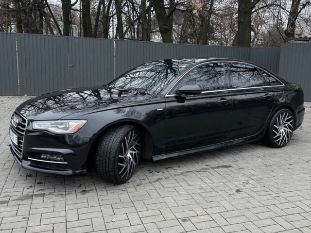 Чорний Ауді А6, об'ємом двигуна 2 л та пробігом 160 тис. км за 14800 $, фото 1 на Automoto.ua