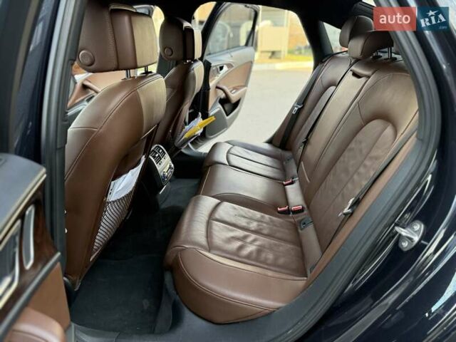 Черный Ауди А6, объемом двигателя 1.98 л и пробегом 167 тыс. км за 16000 $, фото 25 на Automoto.ua