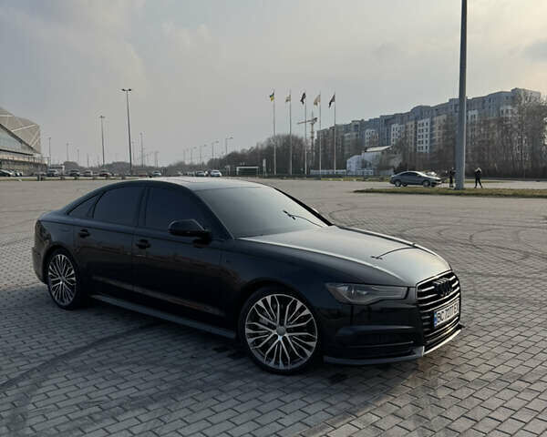 Черный Ауди А6, объемом двигателя 1.98 л и пробегом 147 тыс. км за 14900 $, фото 2 на Automoto.ua