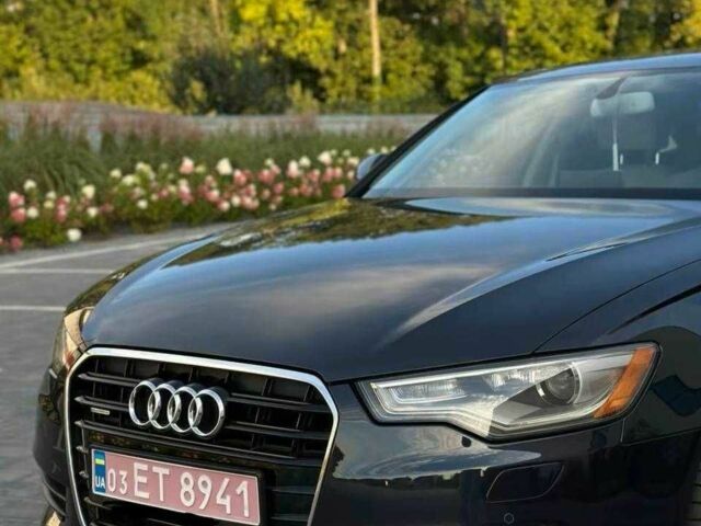Черный Ауди А6, объемом двигателя 2 л и пробегом 165 тыс. км за 15300 $, фото 2 на Automoto.ua