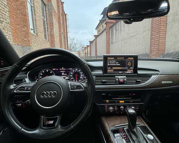 Черный Ауди А6, объемом двигателя 1.98 л и пробегом 240 тыс. км за 15500 $, фото 22 на Automoto.ua