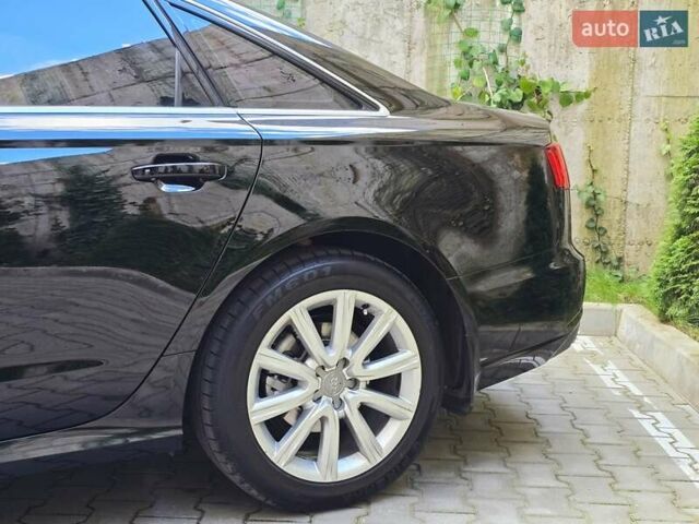 Ауді А6 2015 у Хмельницькому на Automoto.ua Чорний Ауді А6, об'ємом двигуна 1.97 л та пробігом 238 тис. км за 19999 $, фото 69 на Automoto.ua