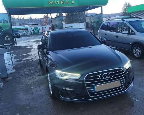 Черный Ауди А6, объемом двигателя 2 л и пробегом 229 тыс. км за 21999 $, фото 1 на Automoto.ua