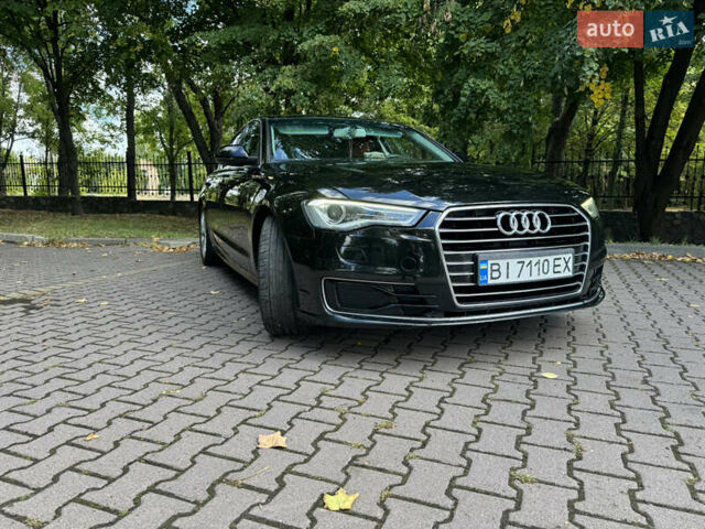 Черный Ауди А6, объемом двигателя 1.97 л и пробегом 221 тыс. км за 23000 $, фото 4 на Automoto.ua