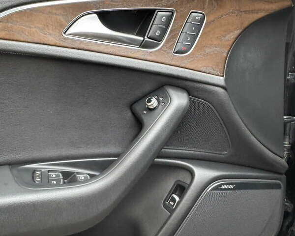 Черный Ауди А6, объемом двигателя 1.98 л и пробегом 240 тыс. км за 15500 $, фото 18 на Automoto.ua