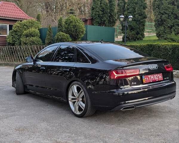 Черный Ауди А6, объемом двигателя 2 л и пробегом 113 тыс. км за 19500 $, фото 3 на Automoto.ua