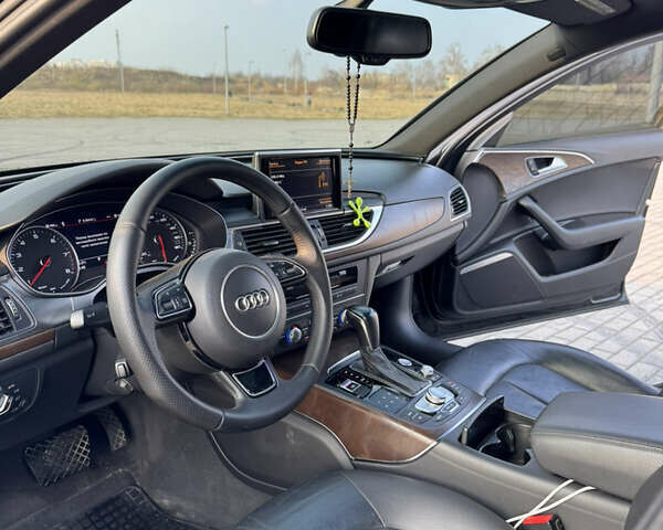 Черный Ауди А6, объемом двигателя 1.98 л и пробегом 147 тыс. км за 14900 $, фото 8 на Automoto.ua