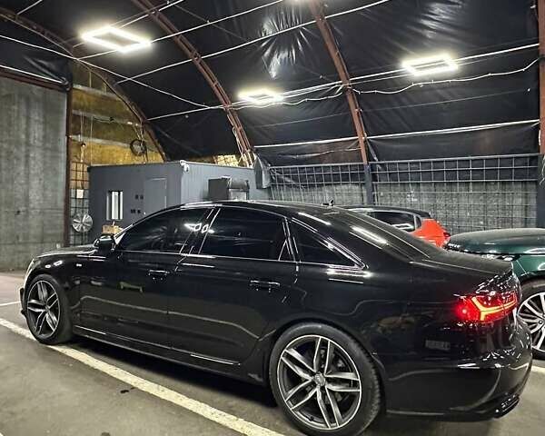Черный Ауди А6, объемом двигателя 1.98 л и пробегом 191 тыс. км за 24000 $, фото 4 на Automoto.ua