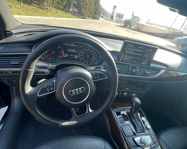 Черный Ауди А6, объемом двигателя 2 л и пробегом 170 тыс. км за 21500 $, фото 16 на Automoto.ua