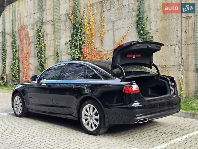 Ауді А6 2015 у Хмельницькому на Automoto.ua Чорний Ауді А6, об'ємом двигуна 1.97 л та пробігом 238 тис. км за 19999 $, фото 80 на Automoto.ua