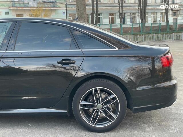 Черный Ауди А6, объемом двигателя 2 л и пробегом 300 тыс. км за 17990 $, фото 13 на Automoto.ua