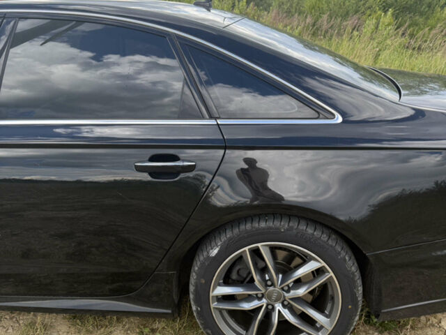 Чорний Ауді А6, об'ємом двигуна 2 л та пробігом 185 тис. км за 13900 $, фото 4 на Automoto.ua