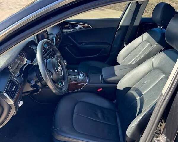 Черный Ауди А6, объемом двигателя 1.98 л и пробегом 155 тыс. км за 12500 $, фото 5 на Automoto.ua