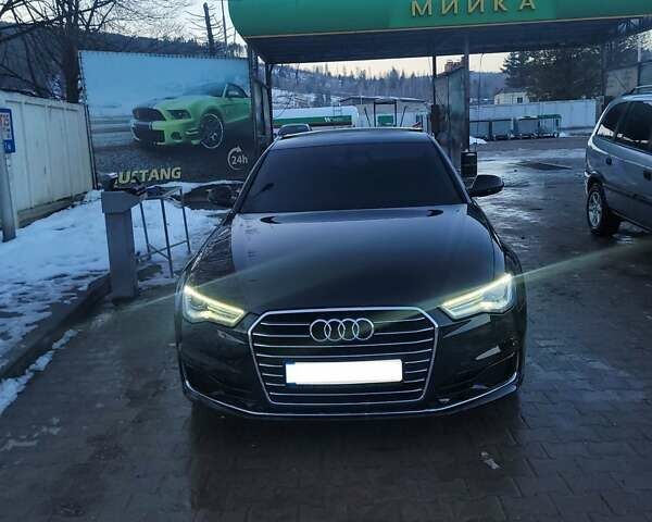 Черный Ауди А6, объемом двигателя 2 л и пробегом 229 тыс. км за 21999 $, фото 2 на Automoto.ua