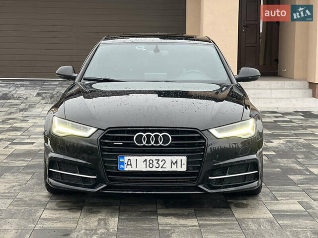 Чорний Ауді А6, об'ємом двигуна 1.98 л та пробігом 240 тис. км за 12900 $, фото 2 на Automoto.ua