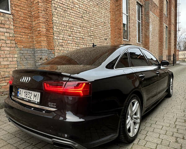 Черный Ауди А6, объемом двигателя 1.98 л и пробегом 240 тыс. км за 15500 $, фото 6 на Automoto.ua
