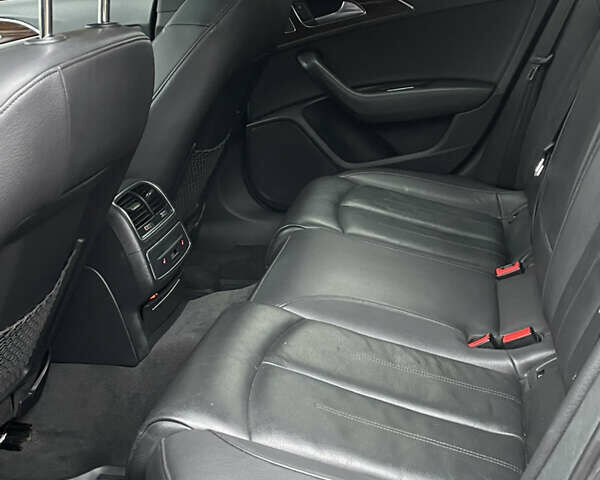 Черный Ауди А6, объемом двигателя 2 л и пробегом 193 тыс. км за 17850 $, фото 103 на Automoto.ua