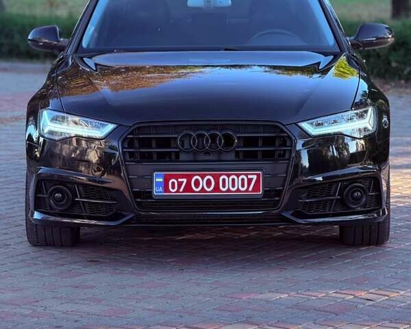 Черный Ауди А6, объемом двигателя 2 л и пробегом 189 тыс. км за 16900 $, фото 2 на Automoto.ua
