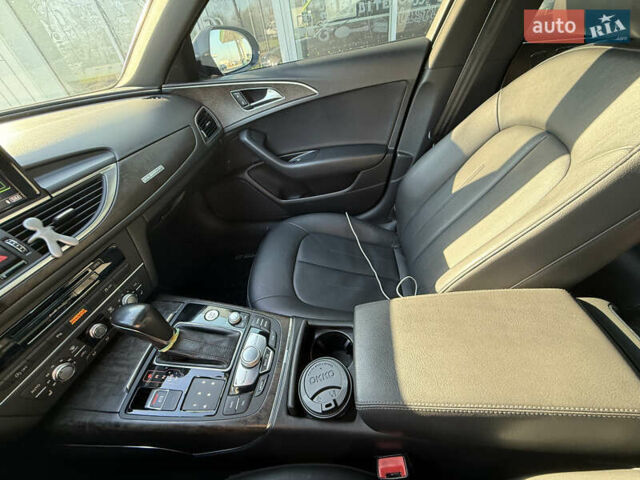 Черный Ауди А6, объемом двигателя 2 л и пробегом 225 тыс. км за 15000 $, фото 10 на Automoto.ua