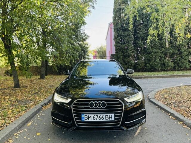 Черный Ауди А6, объемом двигателя 2 л и пробегом 68 тыс. км за 24500 $, фото 1 на Automoto.ua