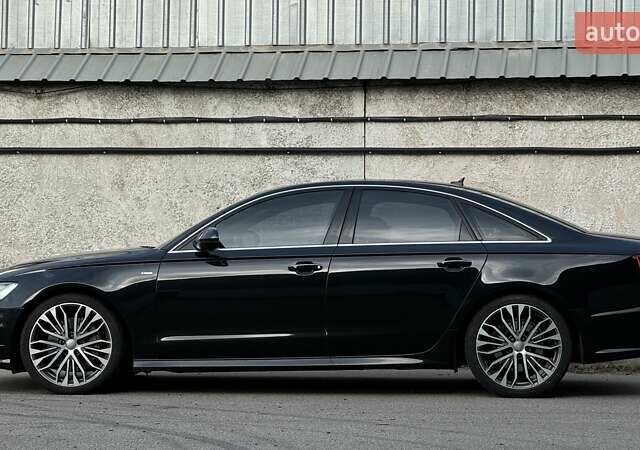 Чорний Ауді А6, об'ємом двигуна 1.98 л та пробігом 104 тис. км за 27500 $, фото 3 на Automoto.ua