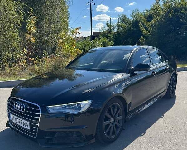 Черный Ауди А6, объемом двигателя 1.98 л и пробегом 206 тыс. км за 17500 $, фото 76 на Automoto.ua