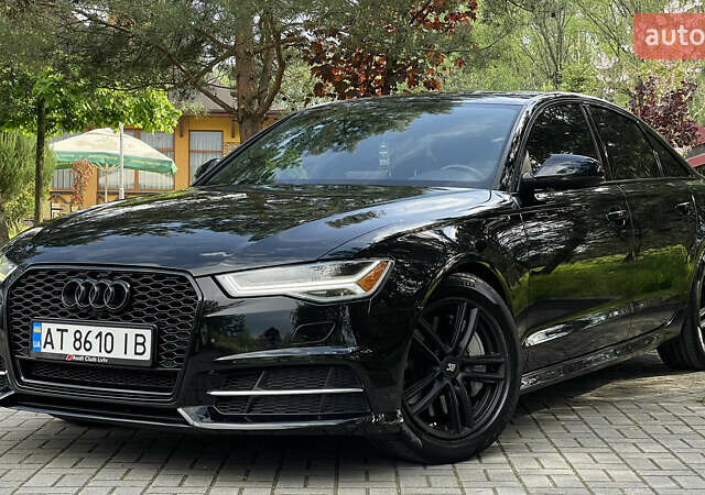 Черный Ауди А6, объемом двигателя 2 л и пробегом 85 тыс. км за 22999 $, фото 2 на Automoto.ua