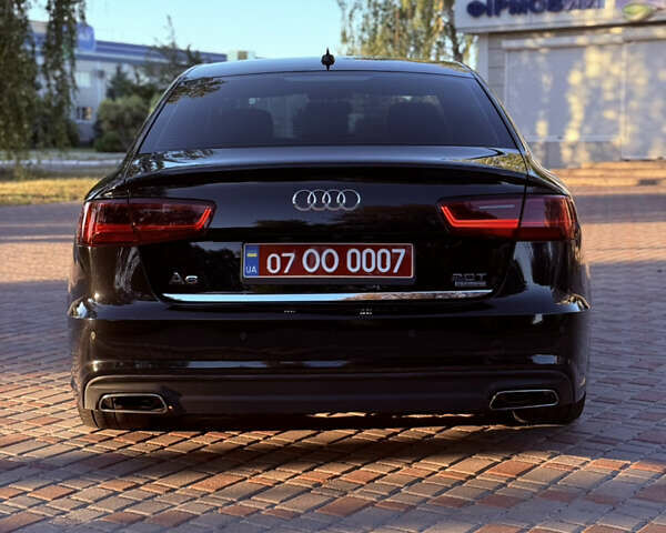 Черный Ауди А6, объемом двигателя 2 л и пробегом 189 тыс. км за 16900 $, фото 17 на Automoto.ua