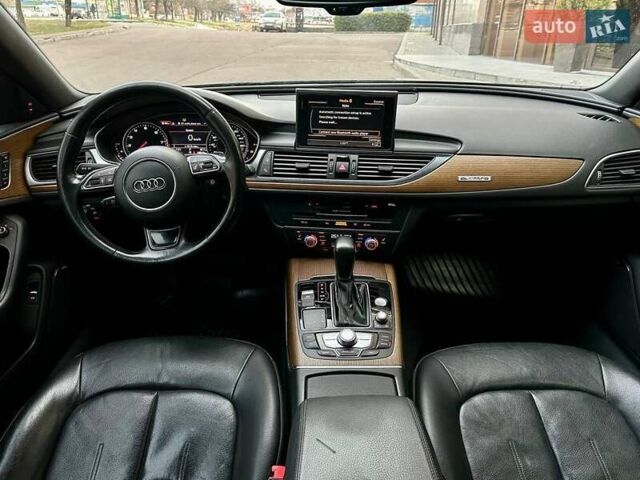 Черный Ауди А6, объемом двигателя 1.98 л и пробегом 186 тыс. км за 16500 $, фото 19 на Automoto.ua